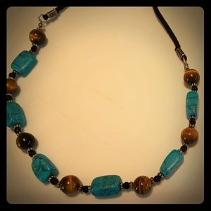 Lia Sophia turquoise and brown stoned necklace.